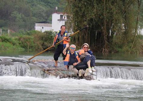 Lishui He Scenic Area: Enchanting River Views and Thrilling Bamboo Rafts!